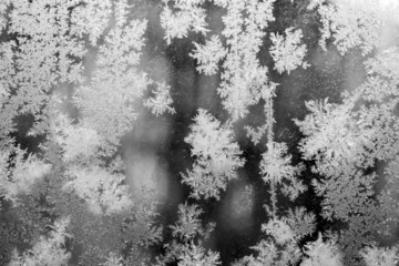 Frost patterns on glass in a close up