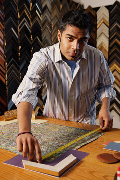 Young man framing a picture