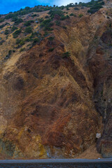 rocks of Cape Fiolent against the background of the evening sky with clouds