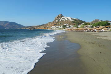 Magazia famous beach in Skyros island below main picturesque village and castle built uphill, Sporades islands, Greece