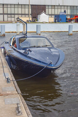 modern motor boat parked on the pier of the Russian city of St. Petersburg, Russia