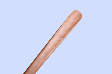 wooden spoon for handmade shoes on a white background, there is a place for writing