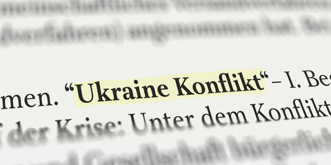 Ukraine Konflikt im Buch mit Textmarker markiert
