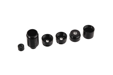 Black silencer for weapons. Suppressor that is at the end of an assault rifle. Isolate on a white...
