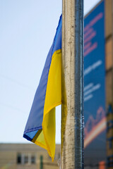 Ukrainian flag flies in the city.