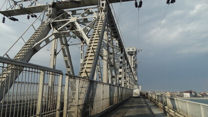 Fototapeta premium Ukraine, Odessa, February 20, 2022, Pidyomnyy Mist, a raised bridge over the mouth of the Danube to the Black Sea, bay,