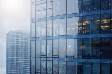 Facade Of An Office Building With The Reflection In The Windows.