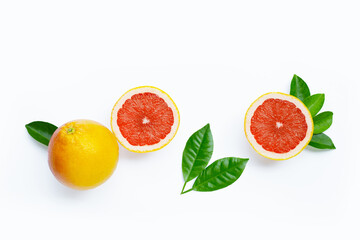 Fototapeta na wymiar High vitamin C. Juicy grapefruit with leaves on white background.