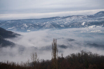 Beautiful scenic view of snow covered mountains and forest in Serbia.