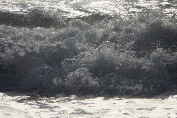 A restless sea. Sea waves. The surf.