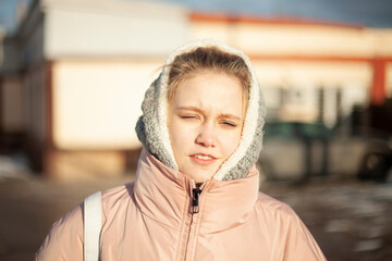 Portrait of a girl in a headscarf.