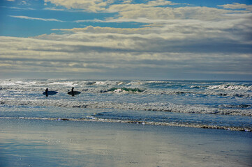 Surfers on the ocean