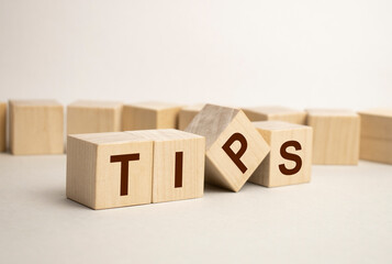 TIPS word made with building blocks on a light background