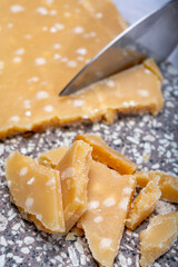 72 months very old Italian parmigiano-reggiano parmesan cheese from Parma has amber color, dry,...