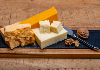 British cheeses collection, Scottish coloured and English matured cheddar cheeses