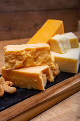 British cheeses collection, Scottish coloured and English matured cheddar cheeses