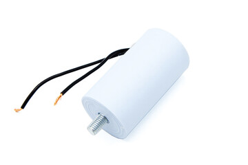 Motor starting capacitor isolated on white background.