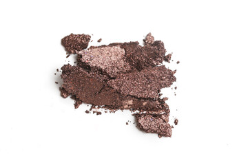 Smashed brown makeup sample isolated on white background