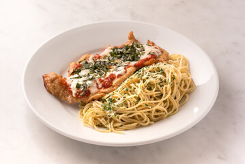 spaghetti with chicken supreme in Neapolitan sauce