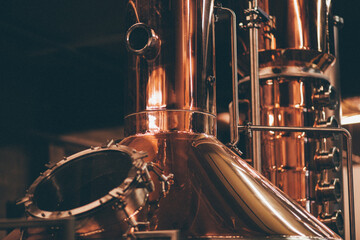 close up of copper whiskey still - Powered by Adobe
