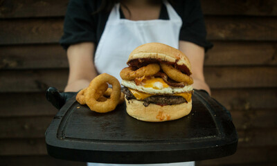 burger and fried onion rings