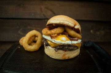 burger and fried onion rings