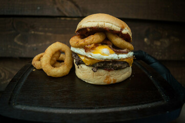 burger and fried onion rings