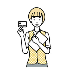 立って書類とカードを手に持つ事務員制服の女性
