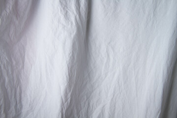 Fototapeta na wymiar Texture of white fabric. White background close up. Factory fabric in white.