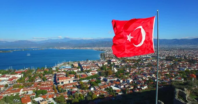 Fethiye Castle with Turkish Flag  aerial footage touristic fethiye town  turkey mediterranean seaside coast turkey