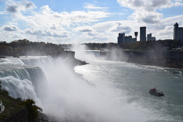 Niagara Falls with maid o the mist and Toronto skyline