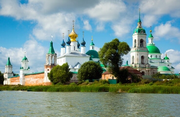 Fototapeta na wymiar View on Spaso-Yakovlevsky monastery complex from lake Nero located in Rostov,