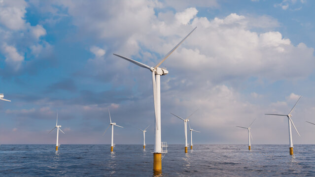 Wind Turbines. Offshore Wind Farm on a Cloudy Morning. Clean Power Concept.