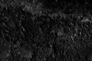 Fototapeta premium Old abandoned rough textured dark cement plaster wall surface for background