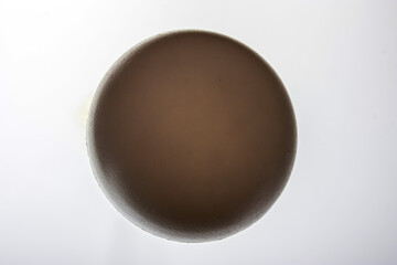 White plastic ball on white background