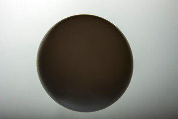 White plastic ball on white background