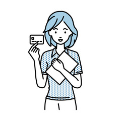 立って書類とカードを手に持つポロシャツの女性