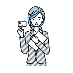 立って書類とカードを手に持つスーツの女性