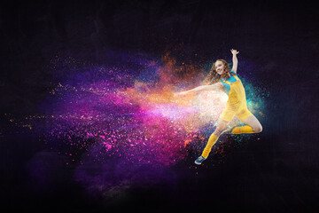 Young woman jumping in the air