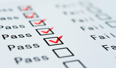 Tick boxes for Pass or Fail on paper