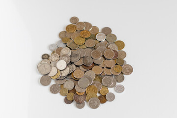 Different coins from all over the world with copy space