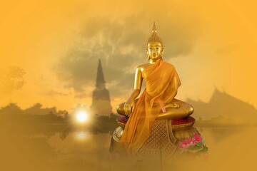Obraz premium Buddha statue sitting on a river and the temple with golden sky background.