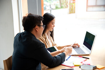 Startup diversity teamwork brainstorming meeting concept. Business young multiethnic team working and planning Start Up in modern office.