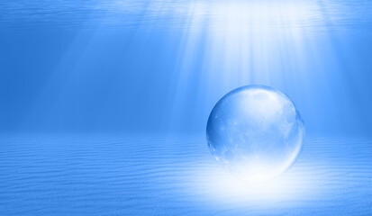 Full glass moon (or crystal ball moon) rising over underwater (under sea) with beach at night 