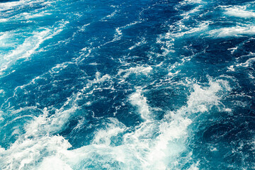 Stormy blue Aare river in Switzerland, close-up.