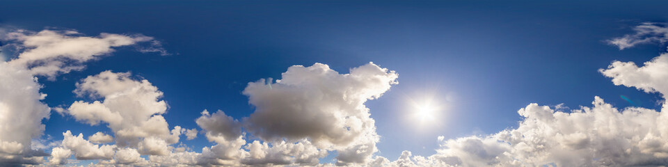 Blue sky panorama with puffy Cumulus clouds. Seamless hdr pano in spherical equirectangular format....