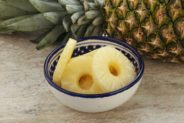 Marinated pineapple rings in the bowl