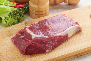 Raw rib-eye beef steak black angus