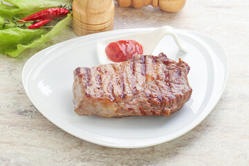 Grilled rib-eye steak beef meat