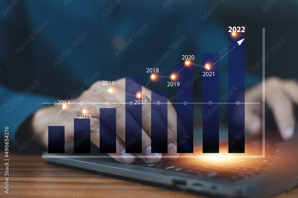 Poster closeup hand using computer trading online on digital chart visual screen technology